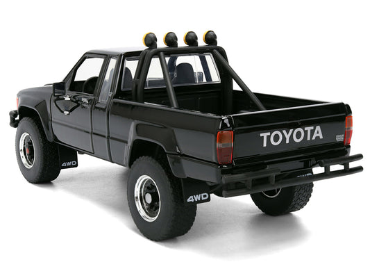 1985 Toyota SR5 Pickup Truck Black with Marty's Skateboard "Back to the Future" (1985) Movie "Hollywood Rides" Series 1/24 Diecast Model Car by Jada
